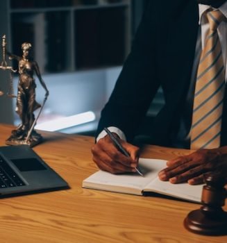 judge-gavel-with-justice-lawyers-having-team-meeting-law-firm-background-concepts-law-legal-services_265022-73723